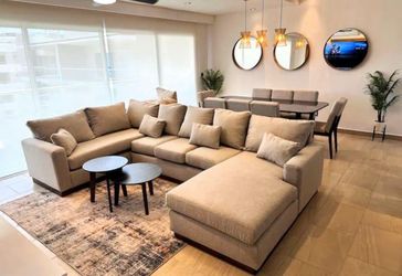 Large Beige Sectional Sofa with Chaise