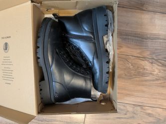 Men's black boots.