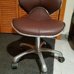  Great Brown Leather Rolling Padding Chair.  Available 5