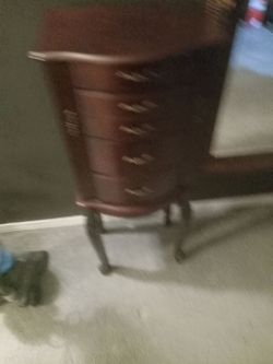 Good condicion dark cherry  Jewelry. Armoire 15"l x 38" h x11"w