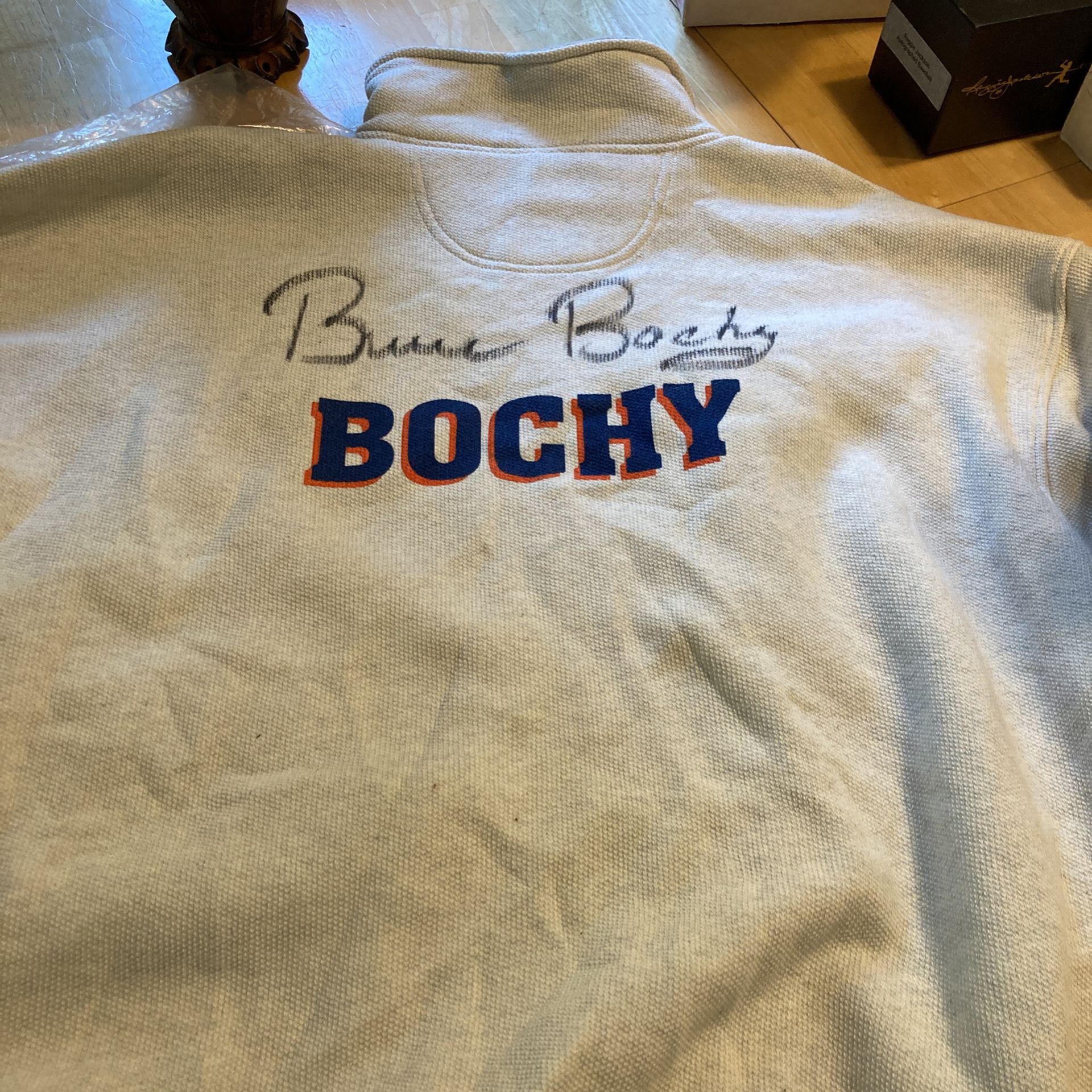 Autographed Bruce Bochy warm up sweat to pull over half zipper
