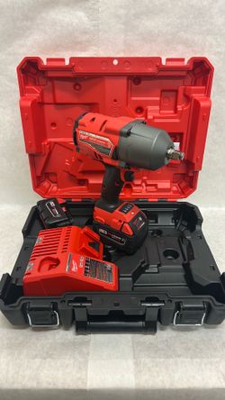 Milwaukee impact half inch brand new with 25.0 XC batteries and charger with case