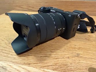 Sony a6700 with Kit 18-135 Sony Lens, flash, video cooler