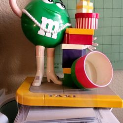 Vintage M&M's Ms. Green Girl M&M Taxi Stand with Gifts Presents Candy Dispenser $25