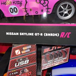 Jada Toys Hello Kitty Nissan Skyline GT-R (Bnr34) Drift Power Slide Elite  R/C, USB Charging, with 4 Extra Tires