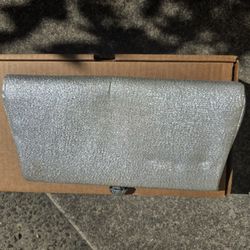 Silver glitter clutch — metallic evening bag
