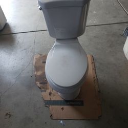 Used Toilet  And New Wax Ring.