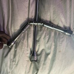 Universal Tire Wrench And Wheel Choks