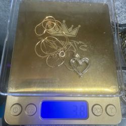18” Chain 14k charm 10k  3.8 grams 