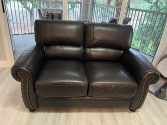 Leather loveseat and arm chair