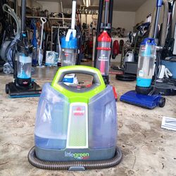 Portable handheld upholstery cleaner
