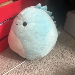 Blue dinosaur squishmallow