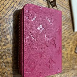 (Louis Vuitton Zippy Wallet)  In The Monogram Empreinte Leather