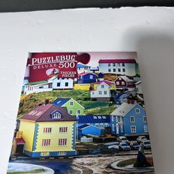 This is a 500-piece Puzzlebug Deluxe jigsaw puzzle. 