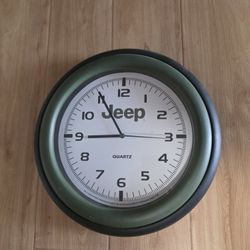 Clock. Jeep Wall Clock. 14 Inches Across. Good Working Condition.