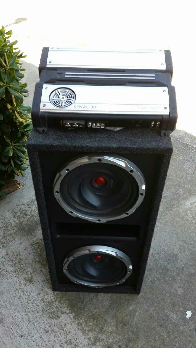 Kenwood dual 10-inch Subs with 700 watt amp and vented subwoofer enclosure great setup rarely used like new condition