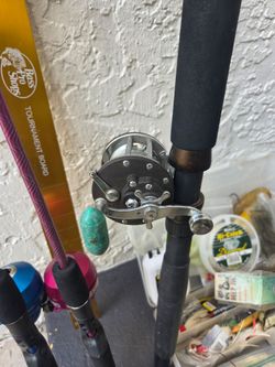 Fishing equipment, Penn stand up slammer boat rod 5'6" 30-60lb line with Penn no. 180 reel , deep sea fishing tackle box, hooks, Hopkins lures, spoons
