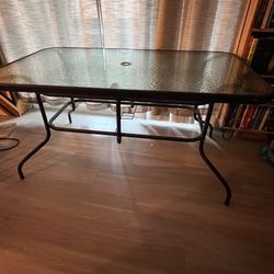 Glass Patio table 31.5” X 55” 