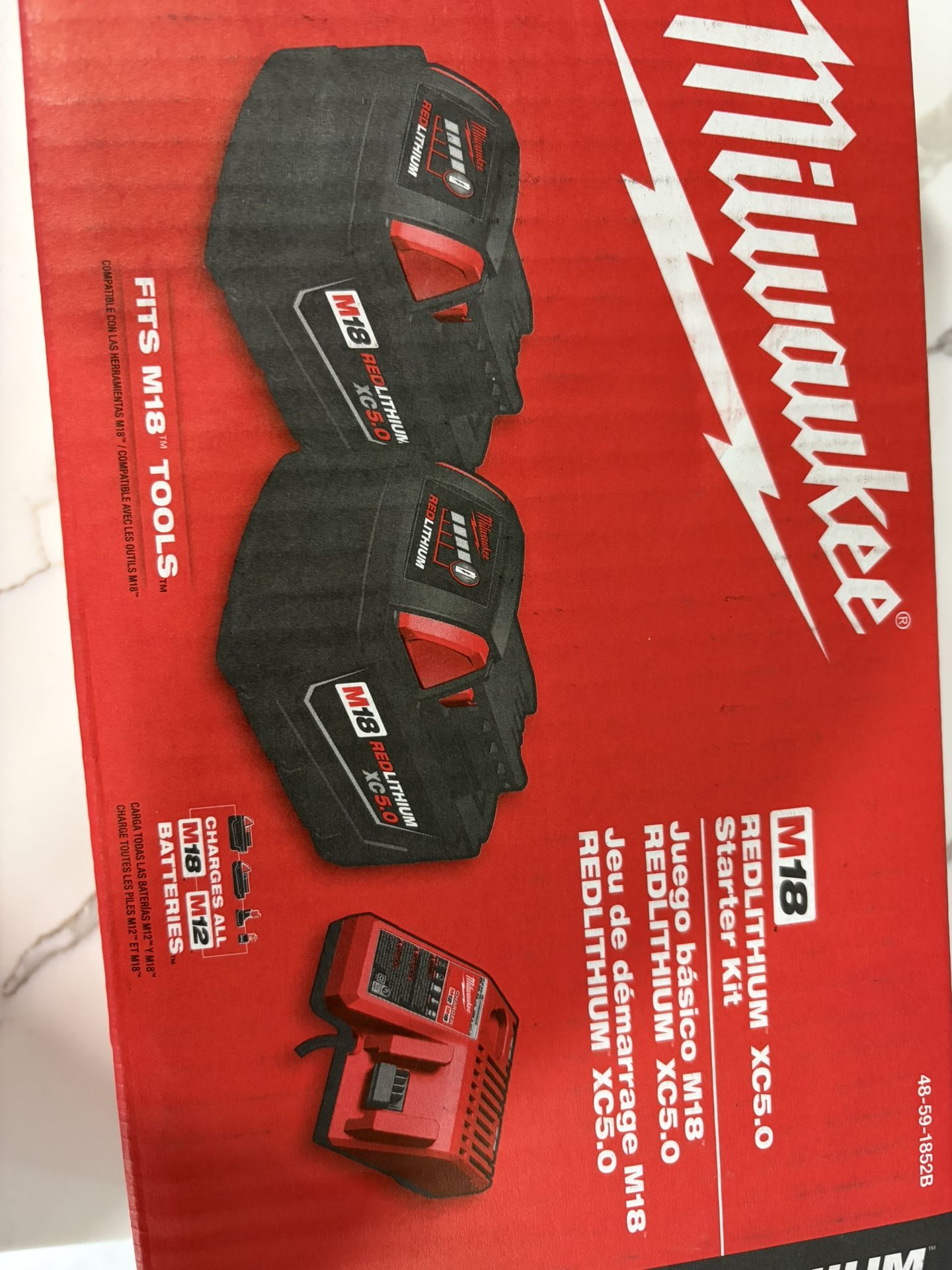 Milwaukee 18v 2-batterys And Charguer New