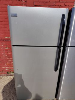 Black and stainless steel refrigerator working great condition
