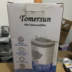 Mini Dehumidifier (never Used )