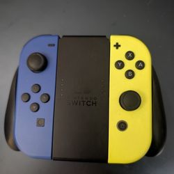 Neon Blue Neon Yellow Nintendo Switch Joycons And Grip