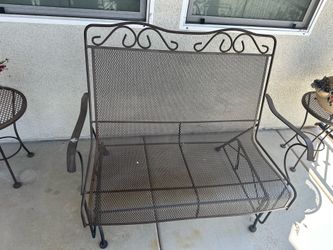 Rocking metal bench