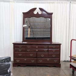 Dark Wood Traditional Dresser with Ornate Hardware