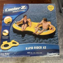 Brand new never opened rapid rider X2 two person inflatable beach raft 