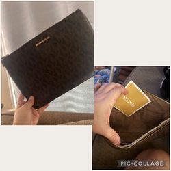 brown and blue mk wristlet