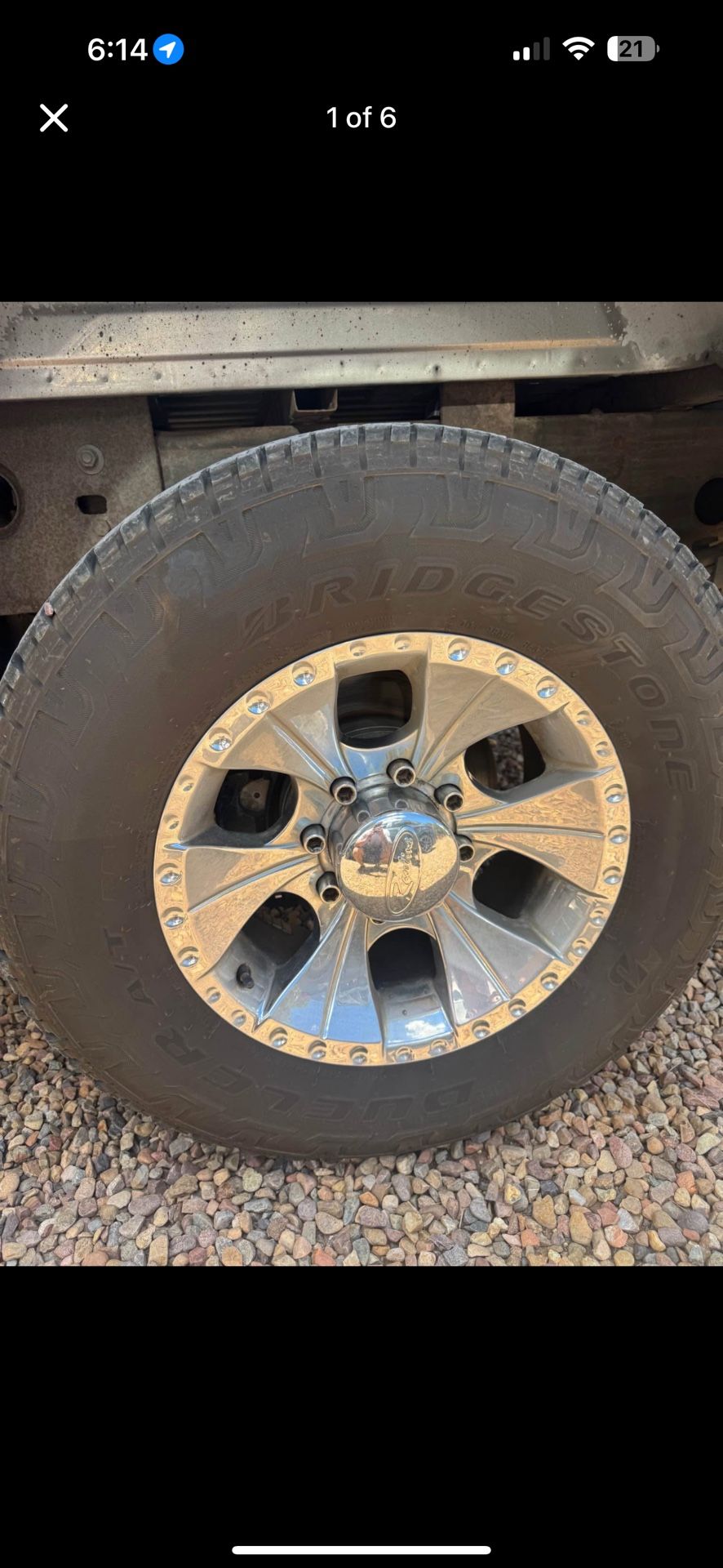 Raceline rims and Bridgestone dueler tires 265/70/17. Almost New