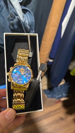 Gold watch- new in box