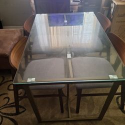 Glass Dinning Table And Chairs 