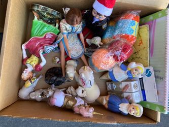 Box of figurines and toys