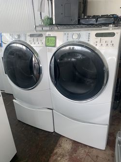 Kenmore front load steam washer & electric dryer w/ pedestals working perfectly