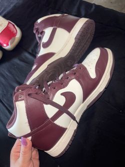 Women’s Nikes burgundy size 8.5