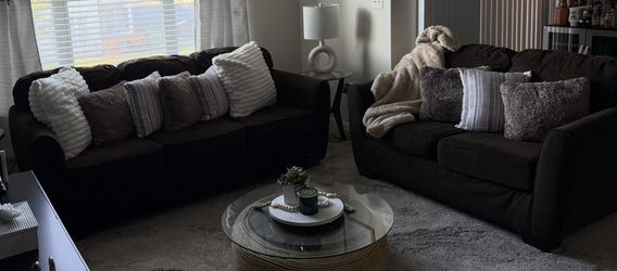 Chocolate sofa and loveseat