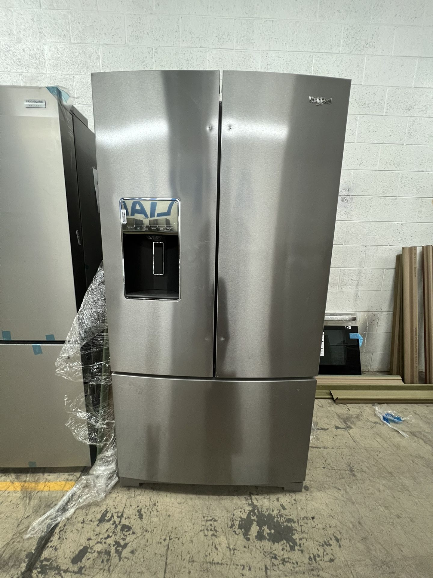 Whirlpool French Door Refrigerator With Ice Maker And Water Dispenser