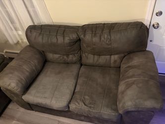 Three piece dark grey couch