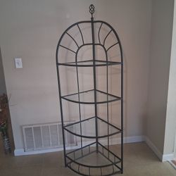 Black wrought iron corner stand
