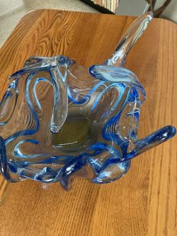 Heavy vase, unusually shaped, perhaps ikebana. Light blue, glass.
