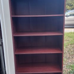 6 shelf brown bookcase. 72"x28"x12". 2 available