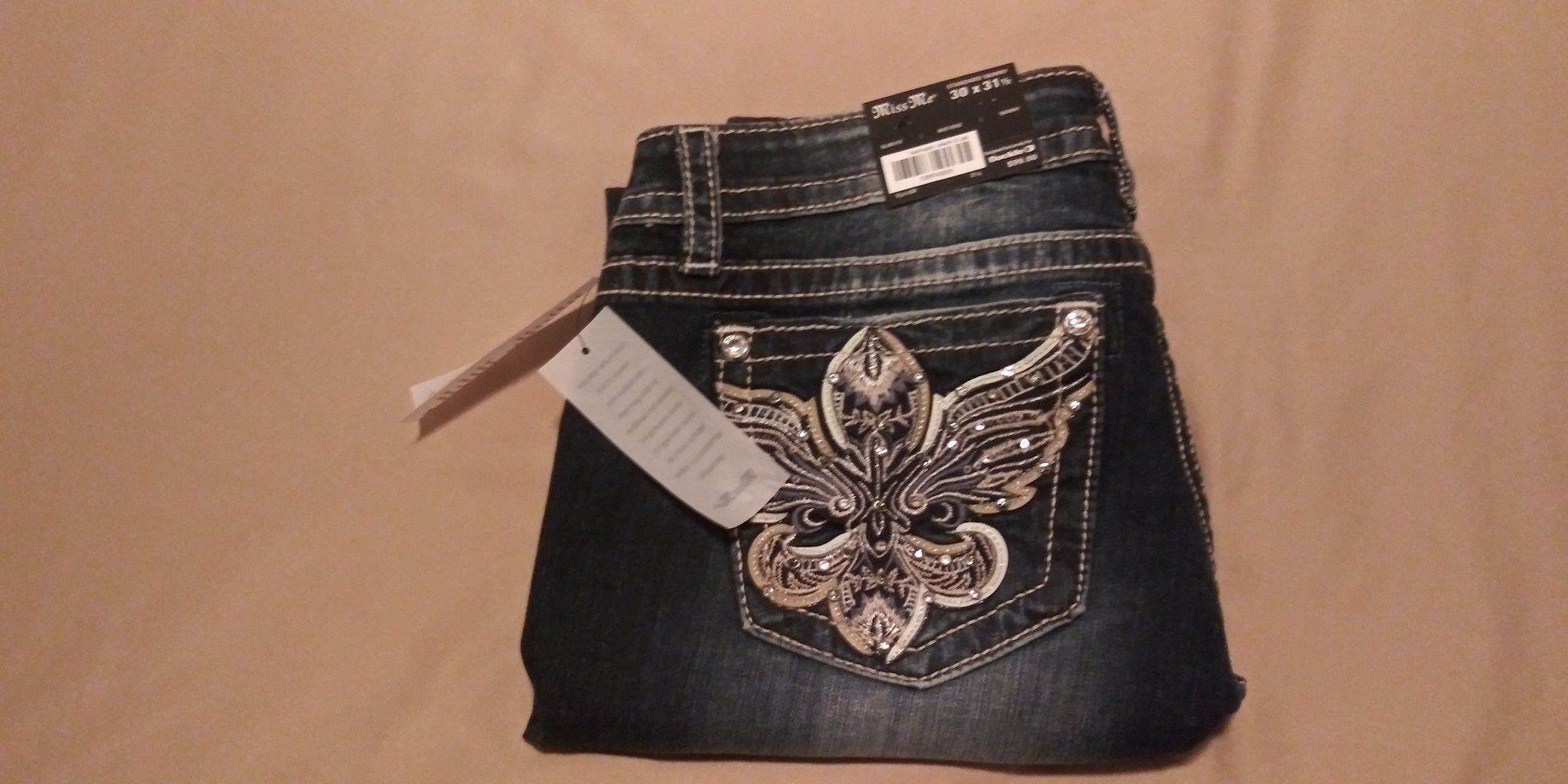 Miss Me brand new size 30/31 never wore firm on the price.