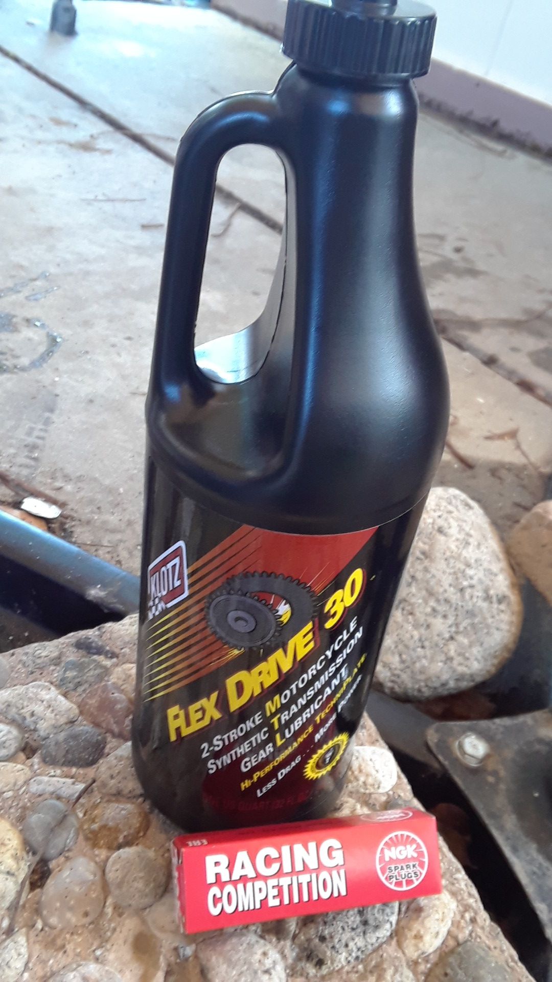 2 stroke dirt bike gear lubircant & spark plugg.