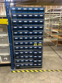 Storage cabinet w 72 bins.