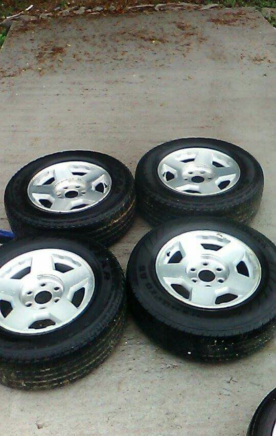 17" Stock Star-shaped Chevy Wheels with all matching Goodyear tires