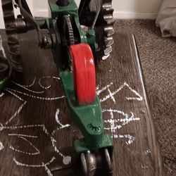 Cast Iron Tracter Sprinkler. SEARS BRAND.