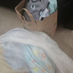Bag Of Baby Blakets And A Paper Bag Of Clothes All For 15