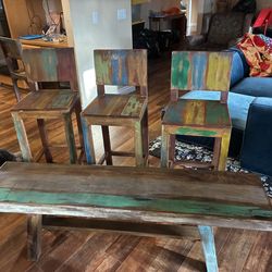 Counter stools and a matching bench