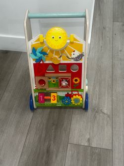Wooden baby walker